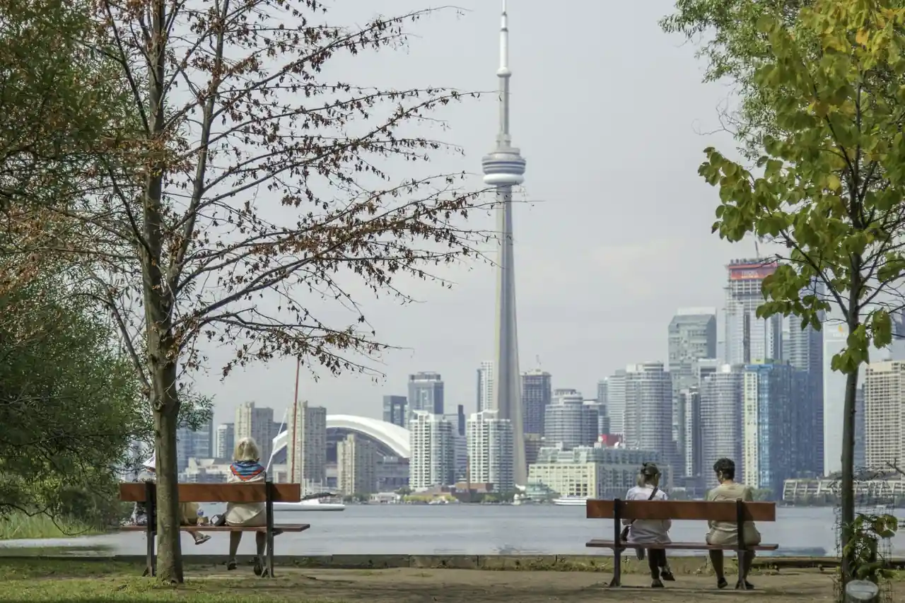 Toronto skyline at dusk, home of McBean Immigration Consulting Inc